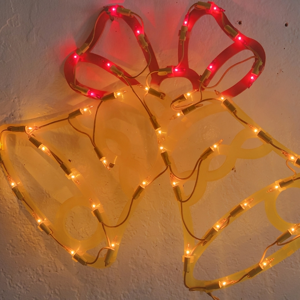 sold Christmas Bells window lights.